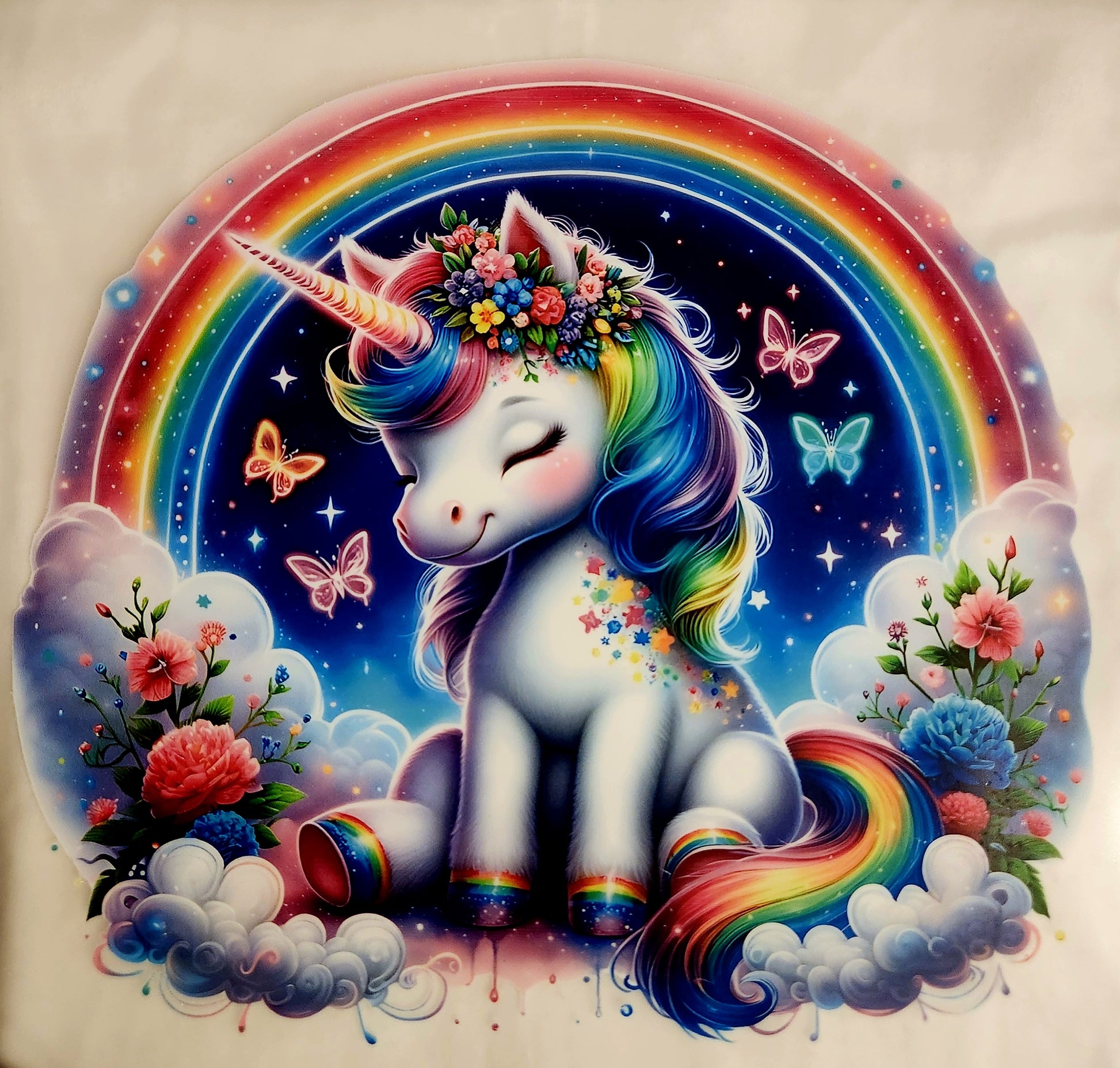 Colorful unicorn with rainbow mane and tail surrounded by flowers and butterflies on a beige background